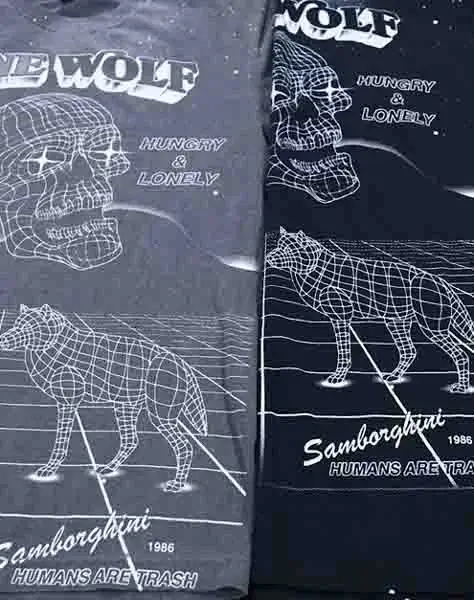 a photo of 2 all over printed shirts in different sizes