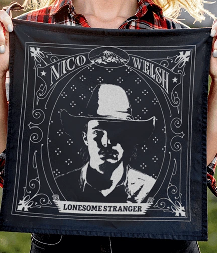 Black bandana featuring a vintage-style illustration of a cowboy and the text Nico Welsh Lonesome Stranger.