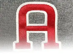 photo of red twill with white satin applique stitching
