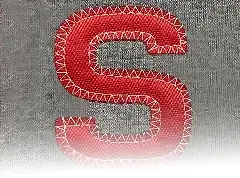 photo of red twill with white triangle applique stitching