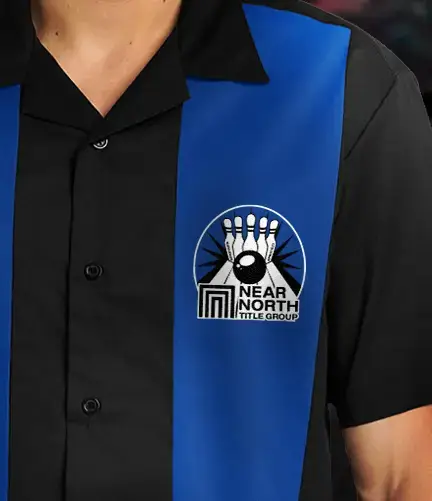 Black and blue retro bowling shirt with custom embroidered logo on the left chest