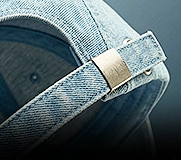 custom dad hat with brass buckle closure strap