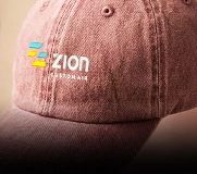 custom garment-dyed dad hat with embroidered logo in pink