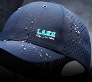 custom performance dad hat with laser perforations and embroidered logo