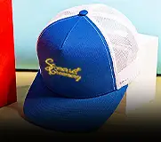 a 5-panel hat with a royal front and white back with gold embroidery on the front