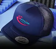 a 5-panel navy blue foam trucker hat with a dtf logo