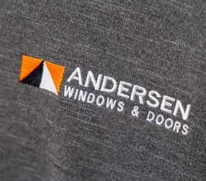 anderson windows logo embroidered on the left chest