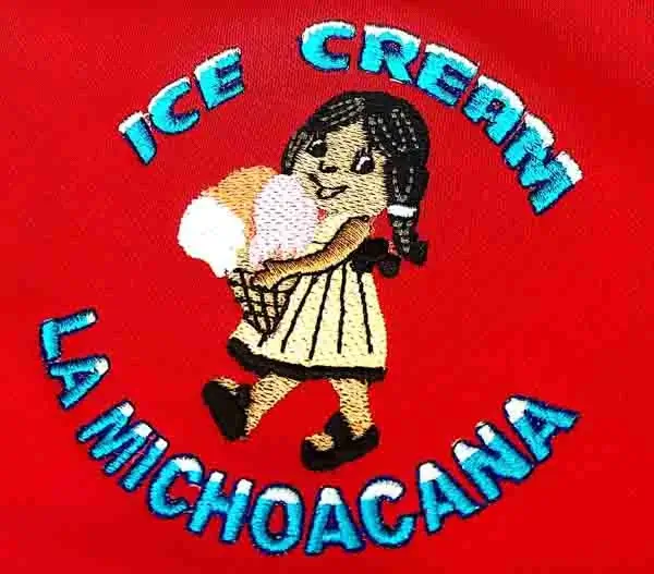 photograph of a business logo of a little girl embroidered on a polo