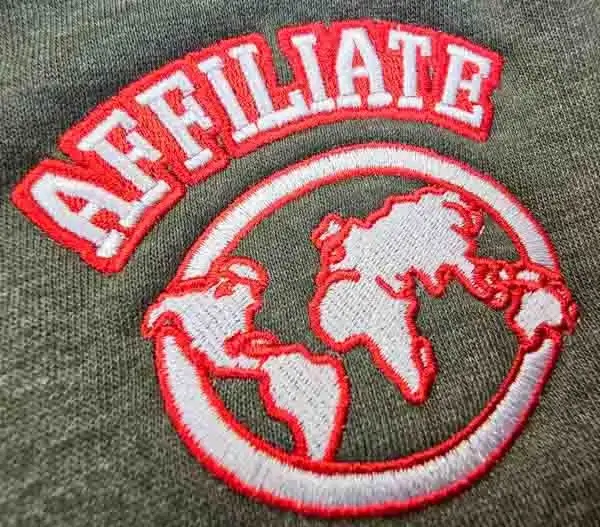 photo of the world map embroidered on a grey background
