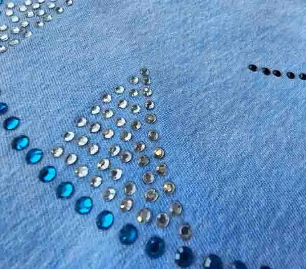 person wearing a military green crewneck with a photographic dtf print