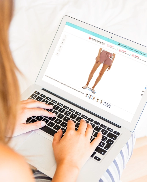 a person designing custom women's shorts in the Broken Arrow Wear online design studio