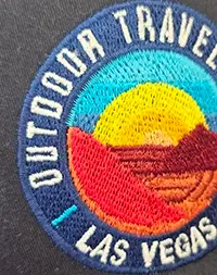 a photo of a circle embroidered on a shirt