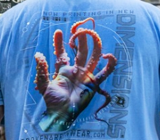 a photo of a dtf design on a shirt of a hand