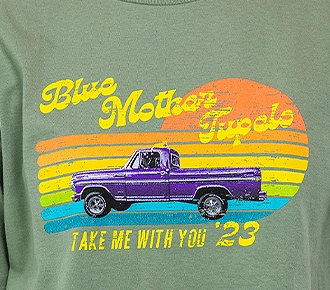 a photo of a bright colored design on a green shirt