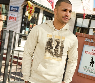 photo of a guy wearing a cream colored french terry hoodie