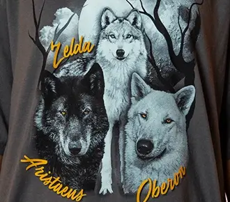 a charcoal t-shirt with a pack of wolves on it