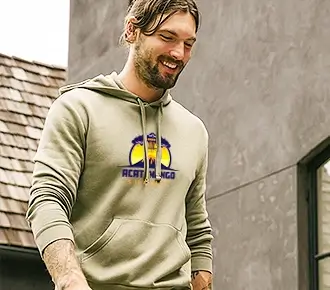 a photo of a guy wearing a lightweight hooded sweatshirt with a yellow and black logo