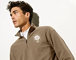 photo of a guy wearing a brown 1/4 zip with a left chest logo