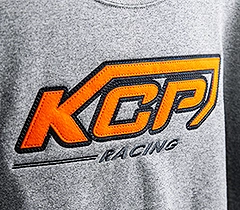 picture of a pink crewneck with a high color photographic direct to garment print.