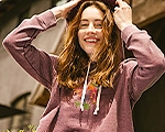 women wearing a customized maroon sweatshirt with a screen print on the front