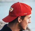 man wearing a red cap