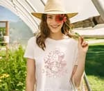 woman wearing a white t-shirt with a print on it