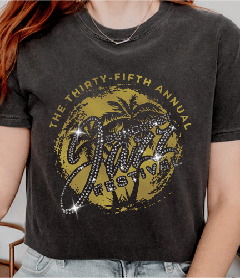 Mockup of a vintage charcoal grey t-shirt with a gold Thirty-Fifth Annual Jazz Festival graphic embellished with sparkling rhinestones.