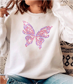 Colorful pink and purple rhinestone butterfly design on a white oversized long-sleeve sweatshirt.