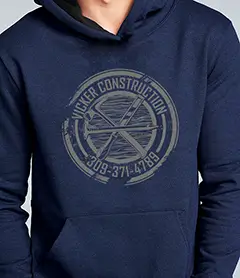 Custom navy blue pullover hoodie featuring a circular reflective vintage-style chest graphic for a local brand.