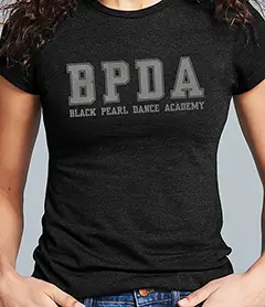 Women's fitted black t-shirt with a BPDA block-letter reflective graphic across the chest.