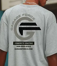 Black hoodie with reflective ink graphic on front showing how reflective screen printing looks under direct light.