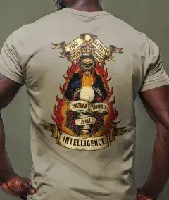 intelligence themed t-shirt with flaming skull and crossed weapons artwork on back